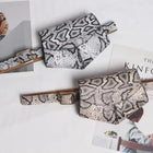 Riñonera Deportiva Corazón Melocotón con Estampado Leopardo para Mujer