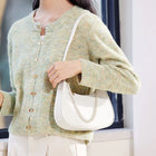 Riñonera de Moda para Mujer 2024 - Bolso Cruzado Elegante y Texturizado